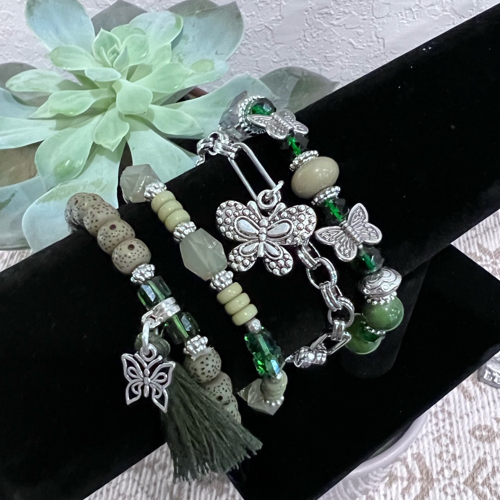 NWOT - Beautiful emerald green, set of four butterfly charm bracelets